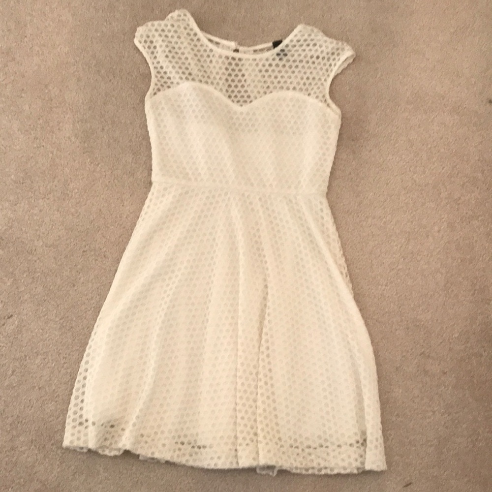 The top of the dress is mesh all lace polka dot